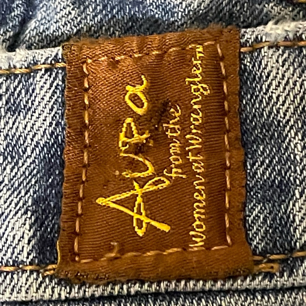 Aura from the women at wrangler. Size 16 tall boot cut jean.